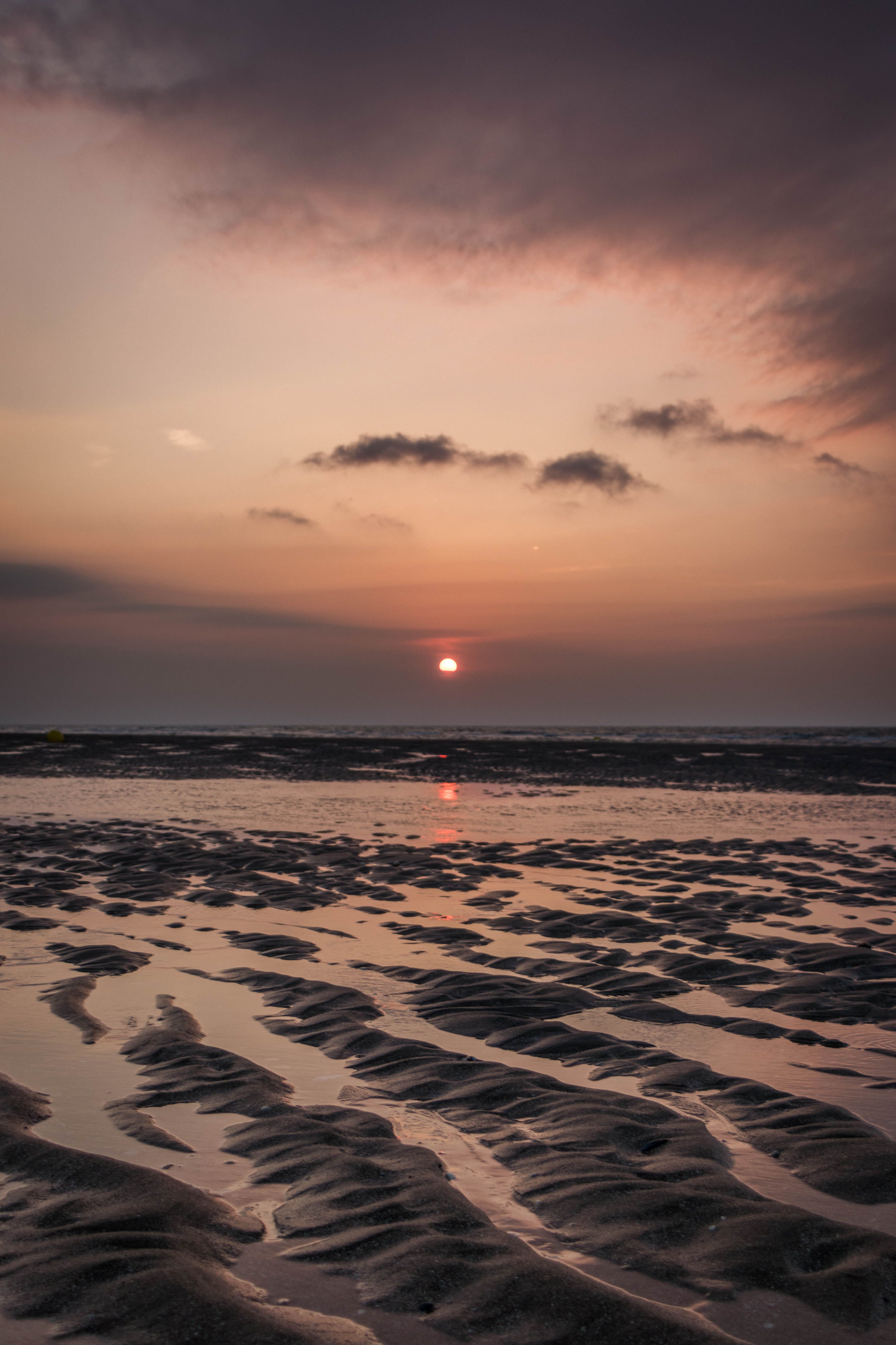 Download wallpaper 3783x5675 coast, sea, sunset, sky HD background