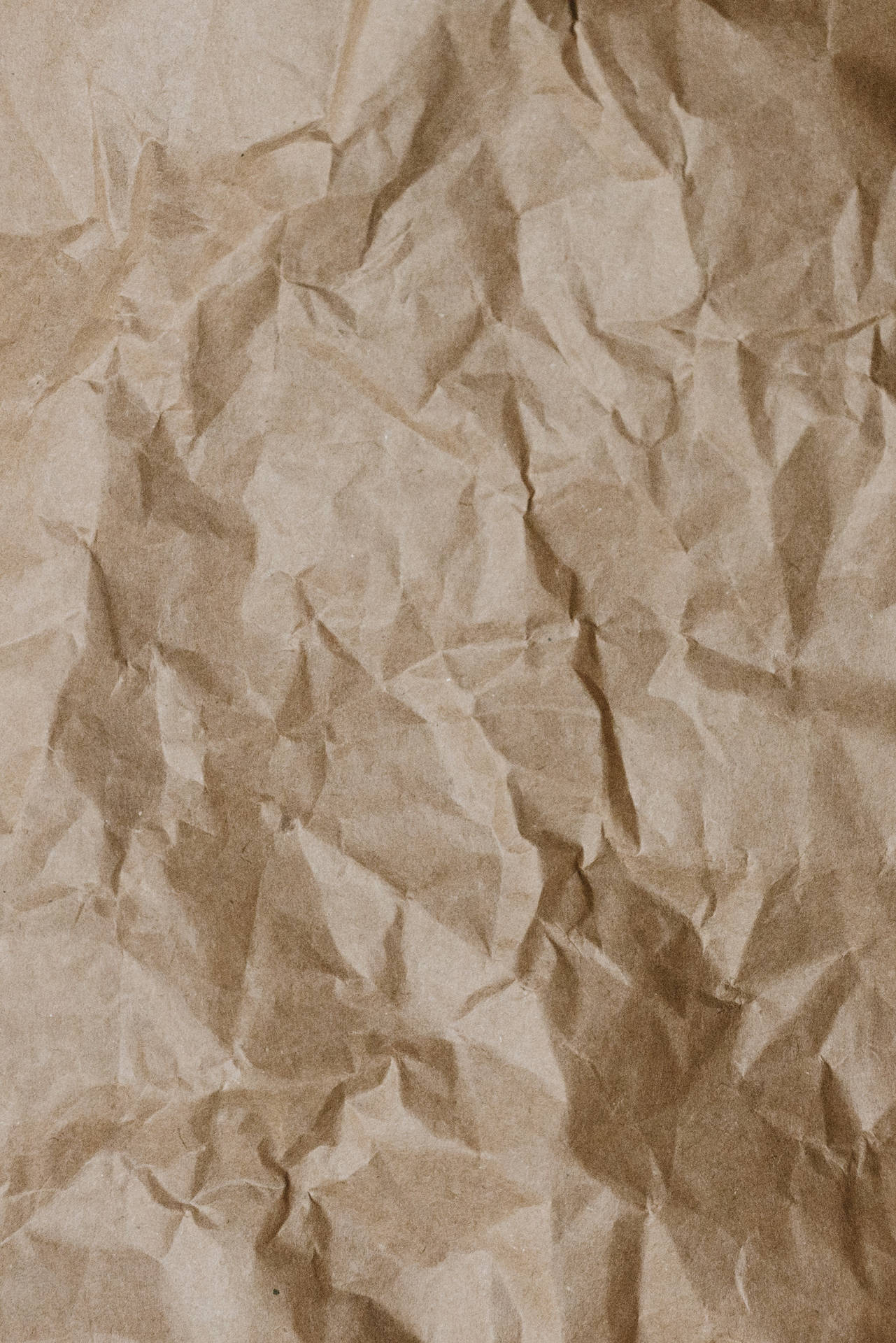 Download Caption: Aesthetic Crumpled Brown Cardboard Paper Wallpaper
