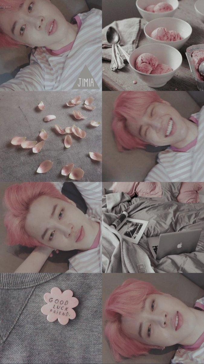 Jimin laying on the ground with pink petals around him and ice cream on the table next to him. He is smiling at the camera. - Jimin