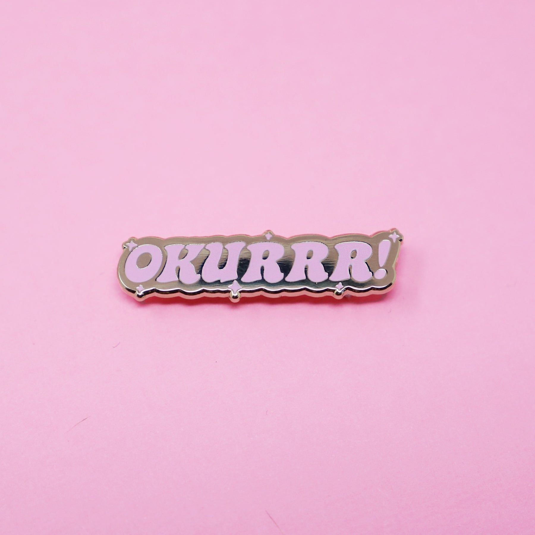 Okurrr enamel pin