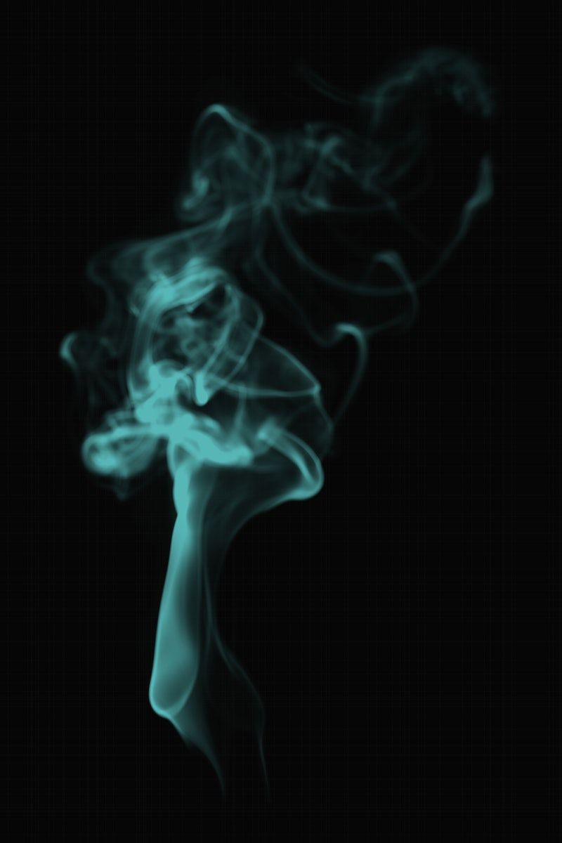 A greenish blue plume of smoke on a black background - Smoke