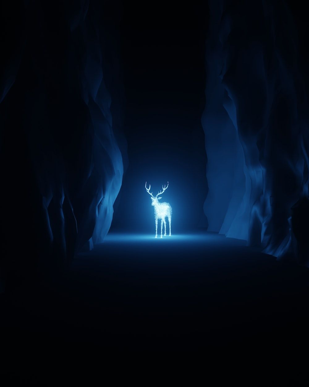 A white stag stands in a dark cave, glowing blue in the center of the image. - Harry Potter