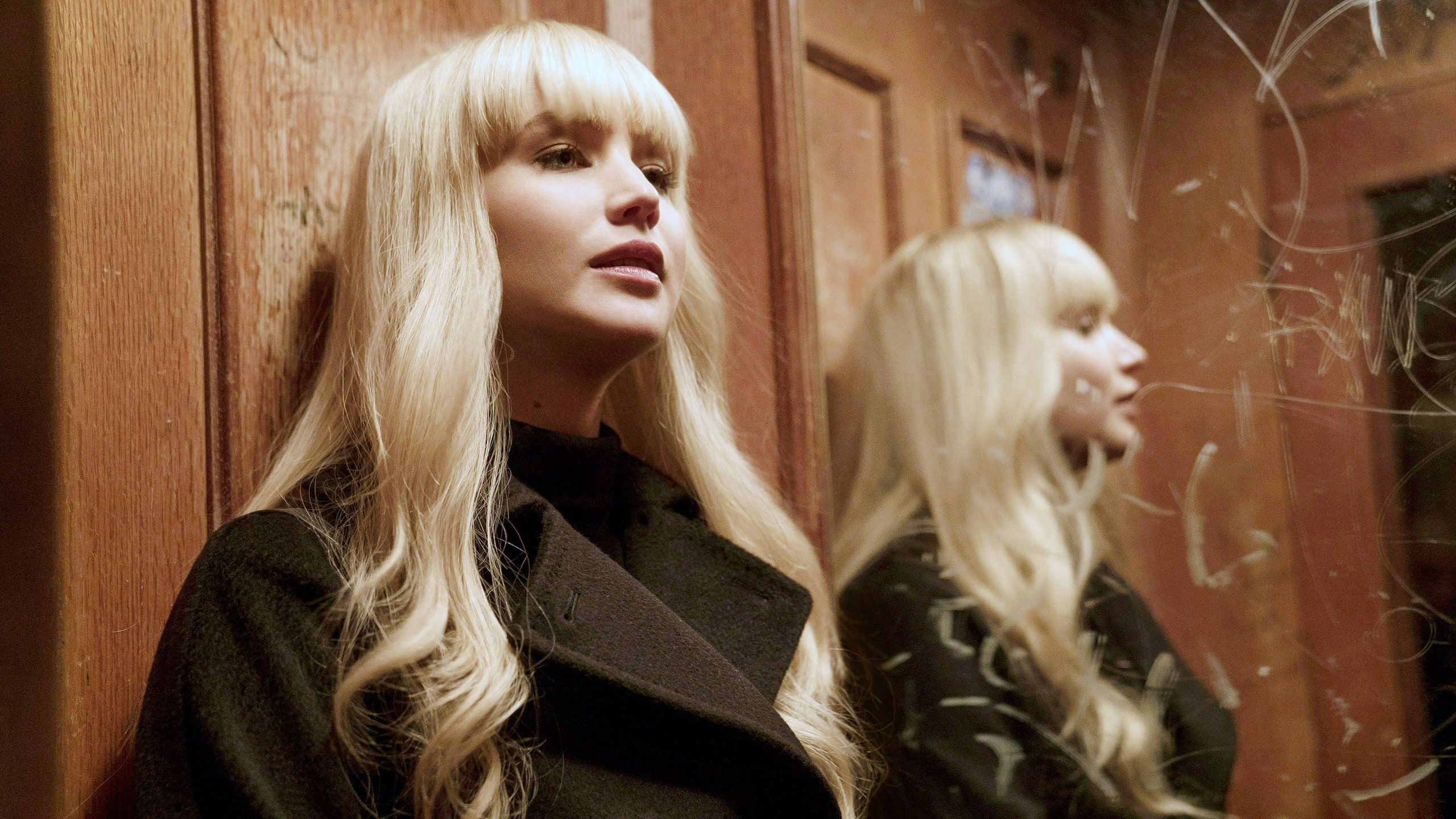 Jennifer Lawrence as a blonde woman looking at her reflection in a mirror - Jennifer Lawrence