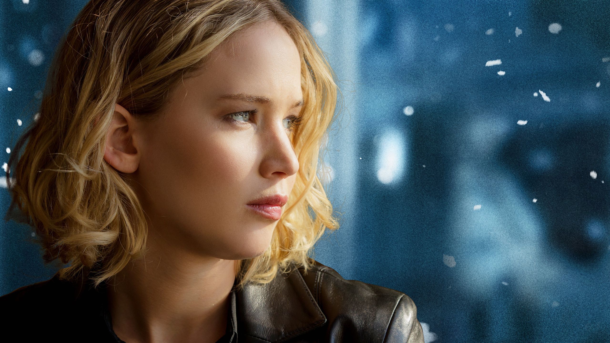 Jennifer Lawrence looking into the distance in a leather jacket in the movie Joy. - Jennifer Lawrence