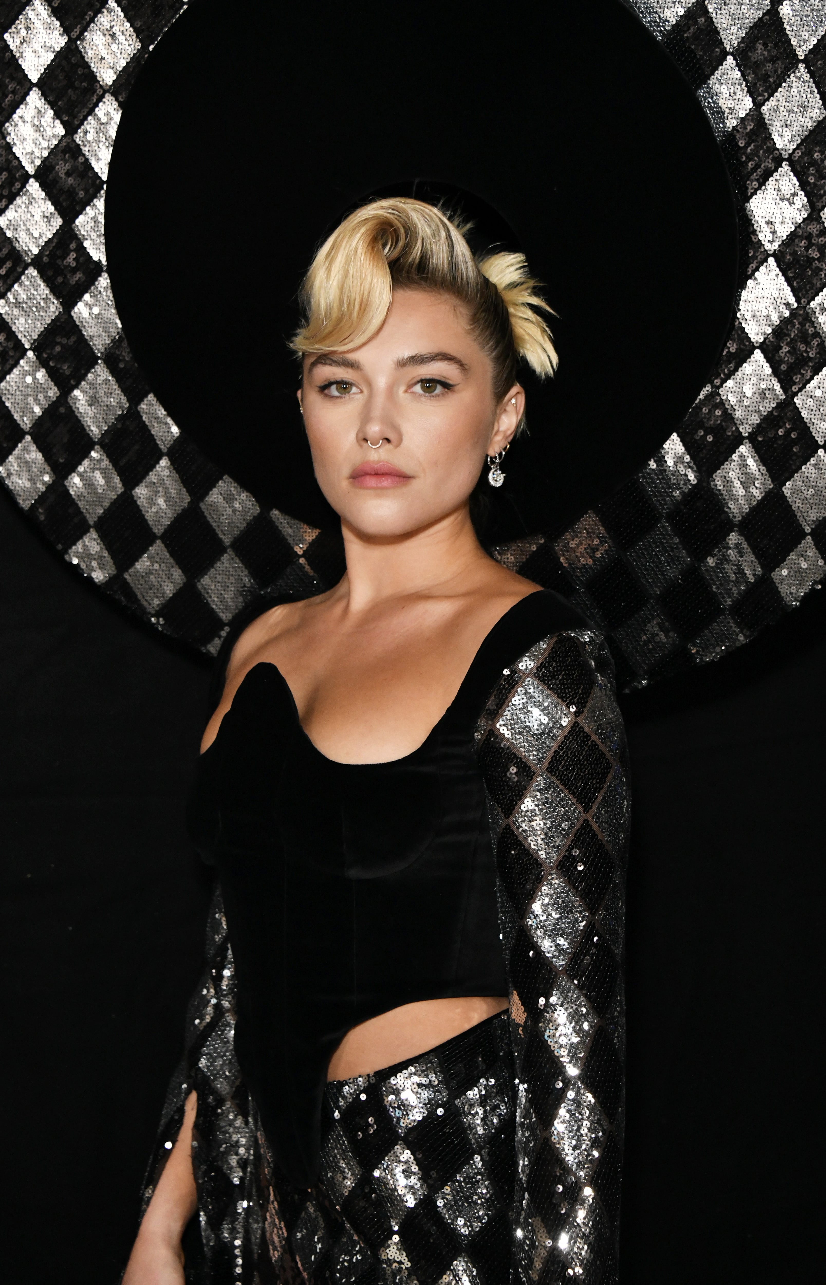 The 23-year-old model is known for her bold fashion choices and is a close friend of the fashion house. - Florence Pugh