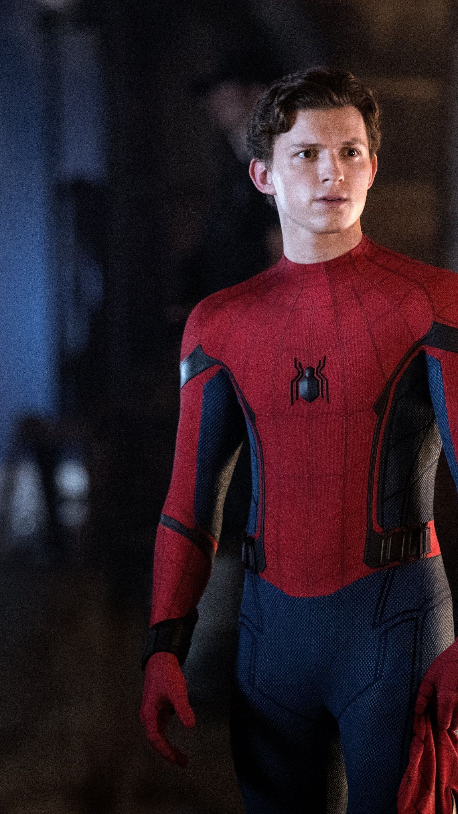 Tom Holland as Spider-Man in a red and blue suit - Tom Holland