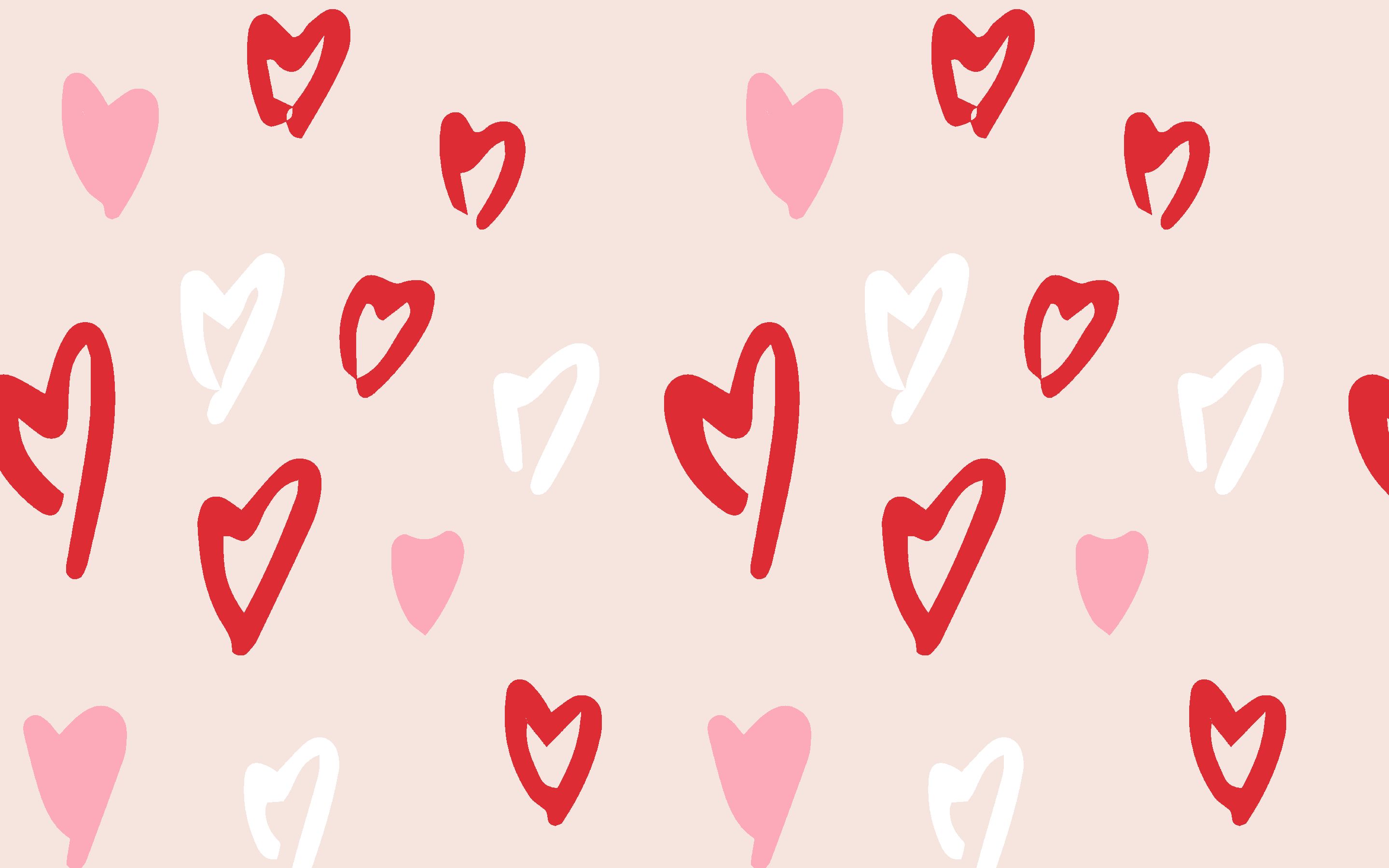 A pattern of red, pink, and white hearts on a pink background - Valentine's Day
