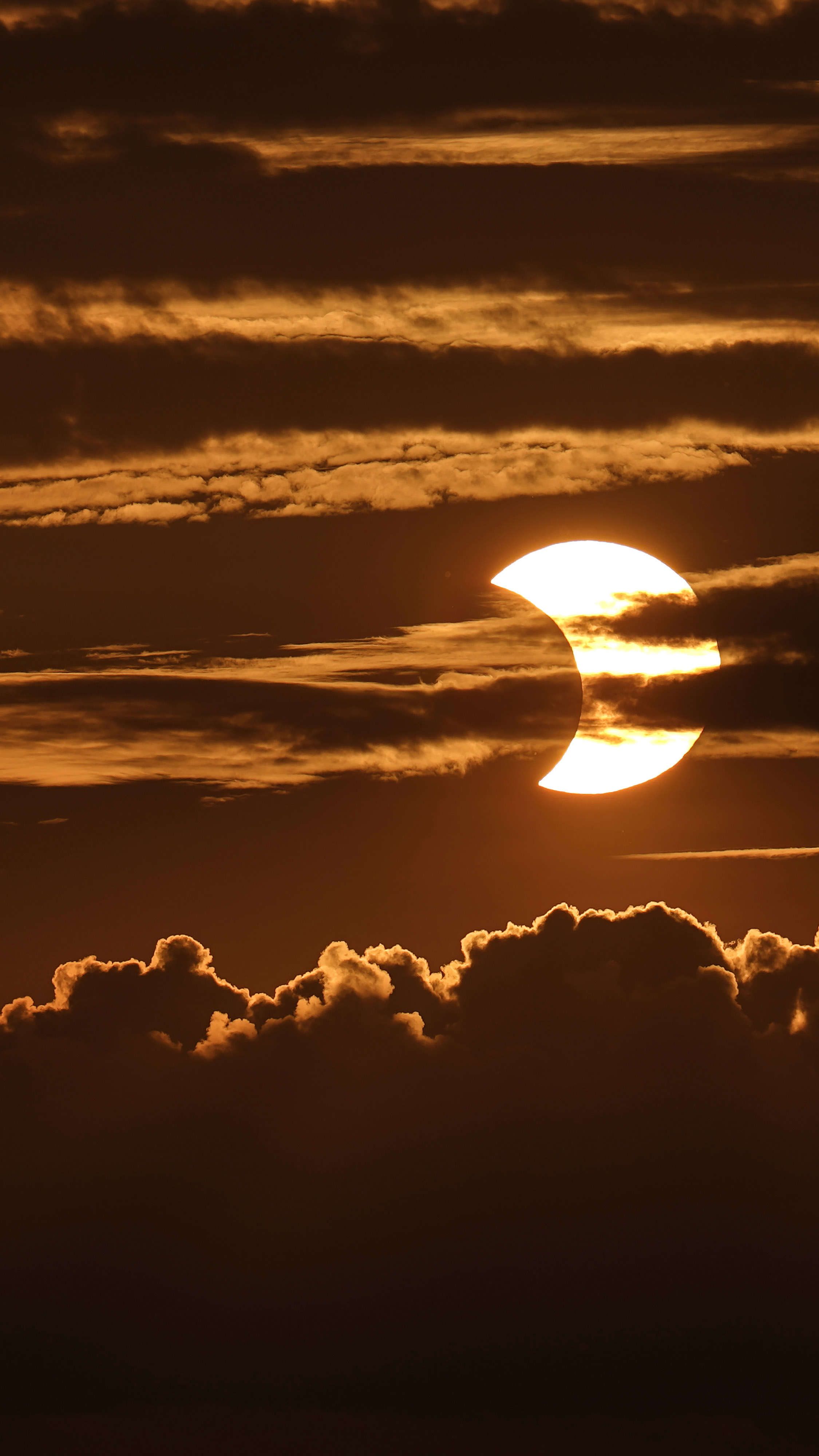 Stunning glimpses of 2021's first solar eclipse from around the globe