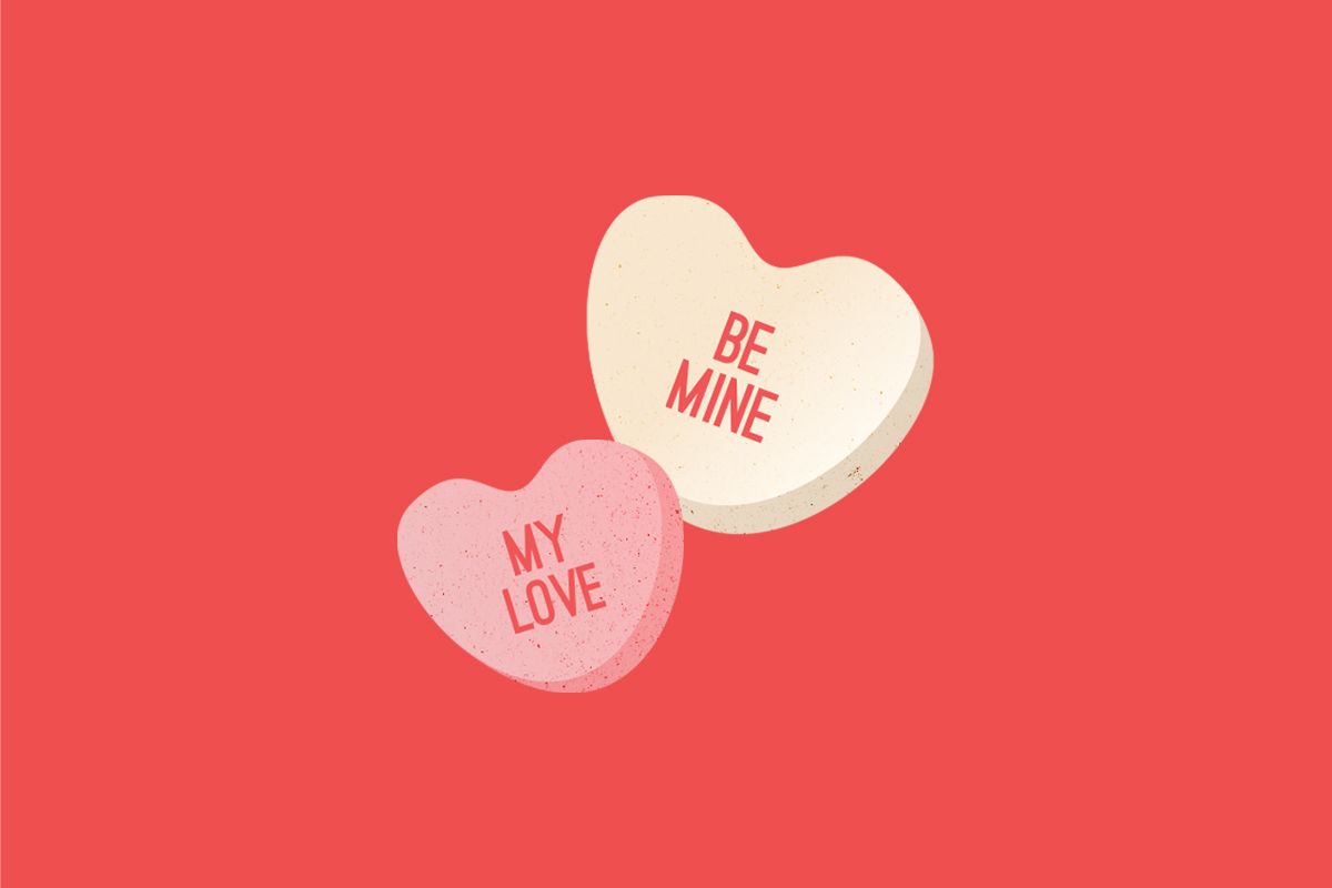 Two heart shaped candy with the words be mine - Valentine's Day