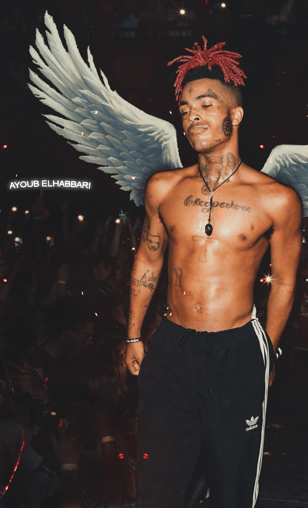 A shirtless 21 Savage with white wings on his back. - XXXTentacion
