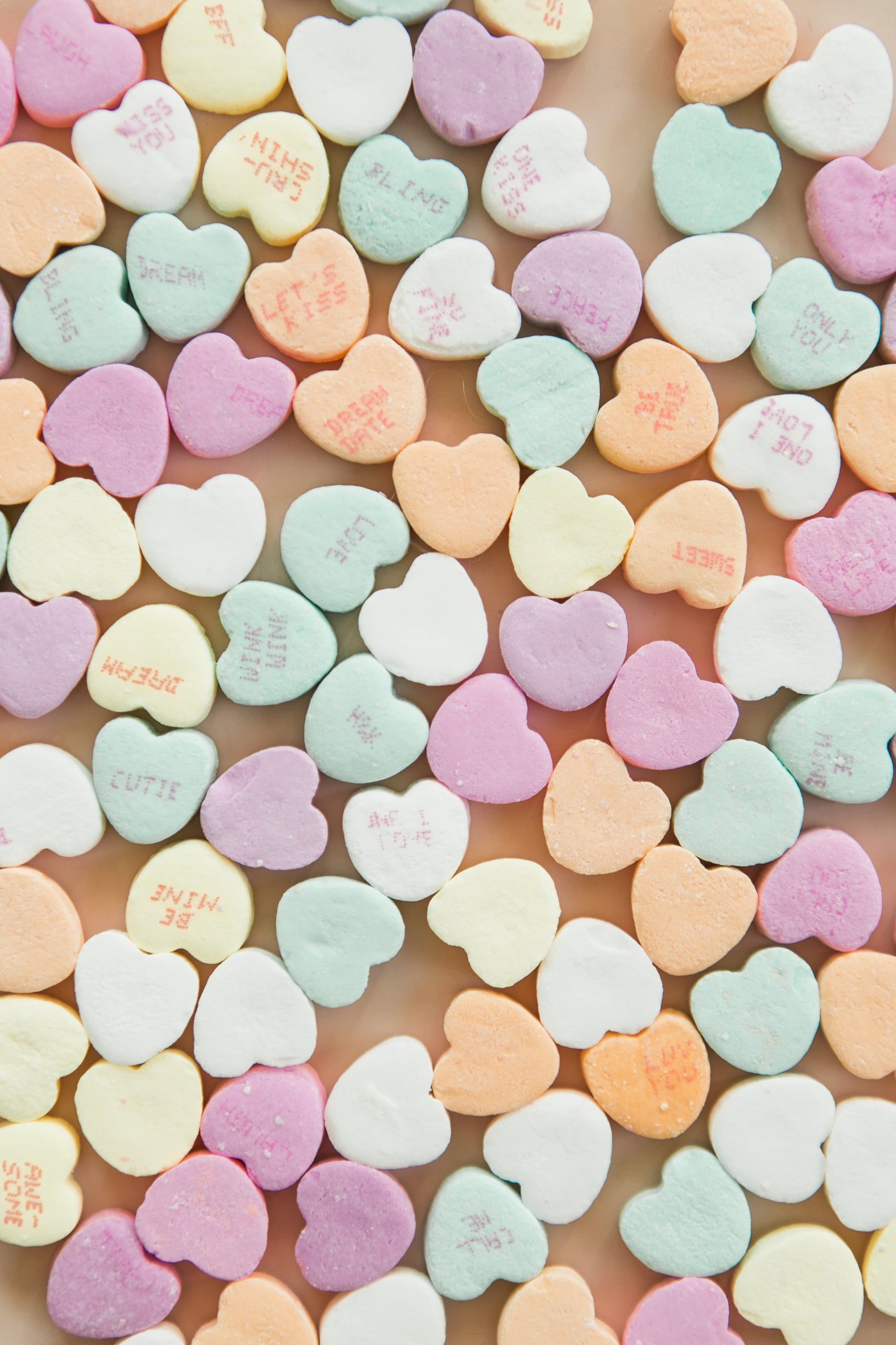 A pile of candy hearts with different sayings on them. - Valentine's Day, heart, candy, colorful, bling