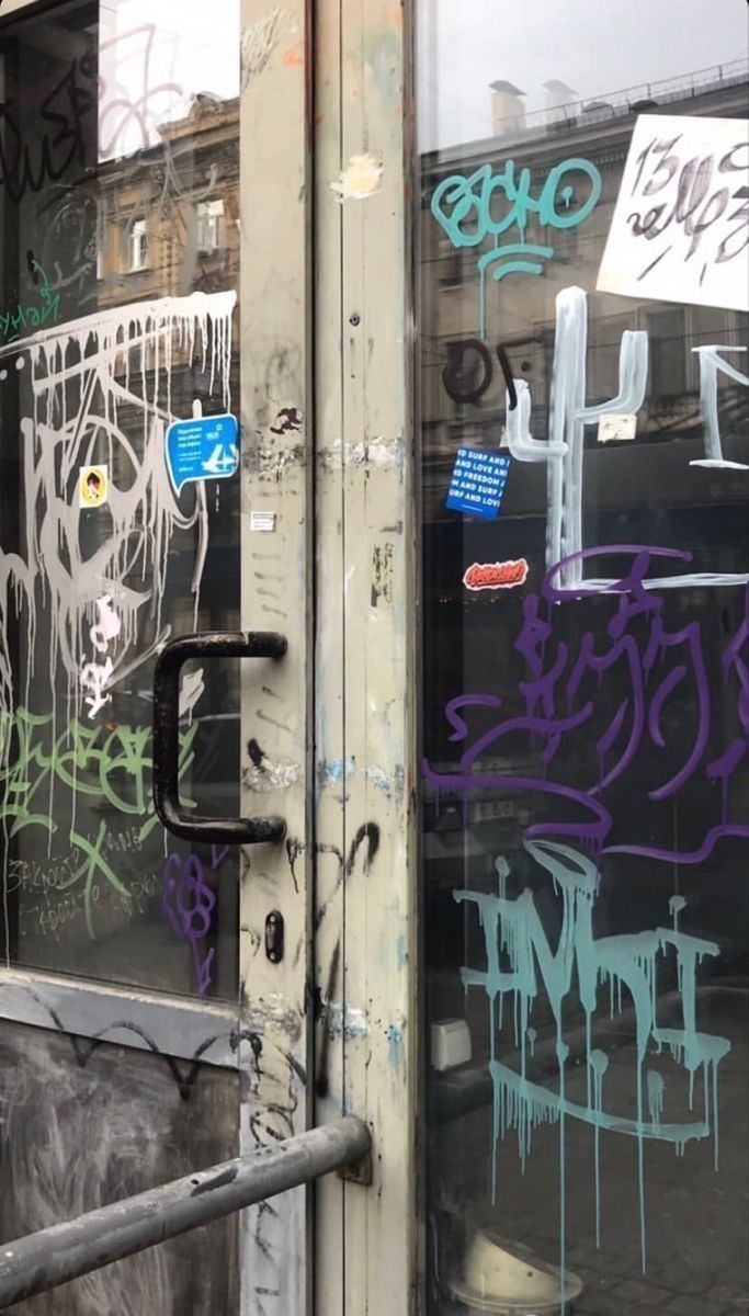 A door with graffiti on it - Street art