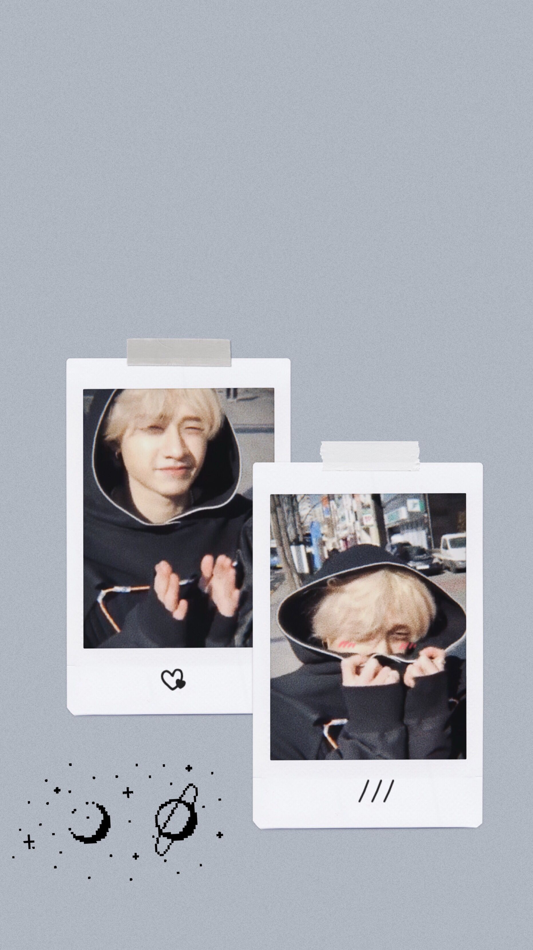 A picture of two pictures on the wall - Bang Chan