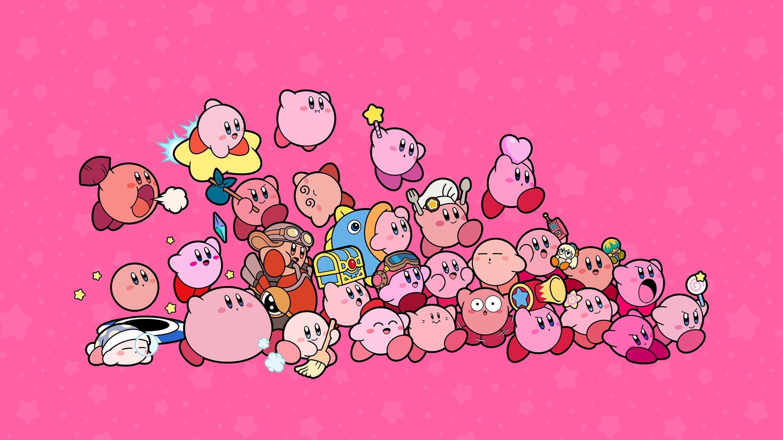 A wallpaper of many different Kirby's from the games. - Kirby