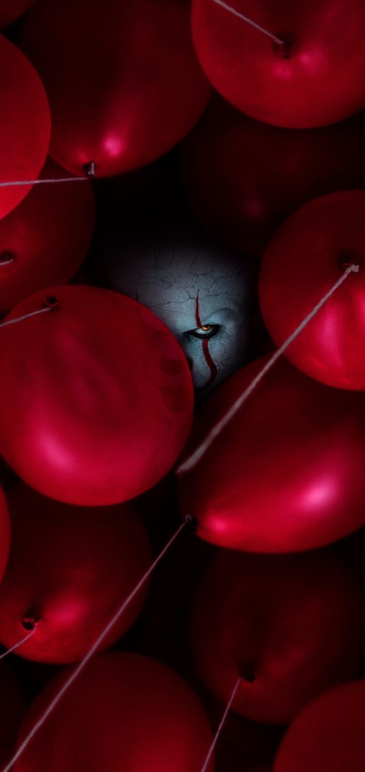 Red balloons on a black background - Pennywise