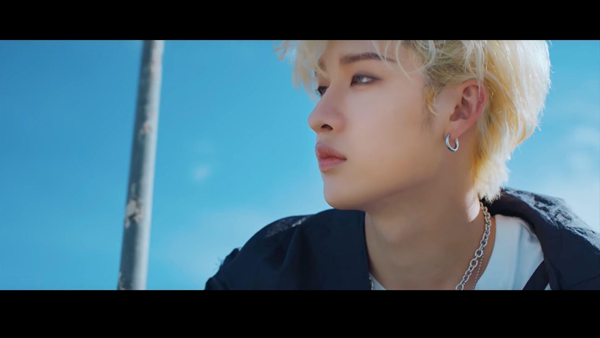 The boyband's leader, Suga, in the music video for ' Shoot Out The Light'. - Bang Chan