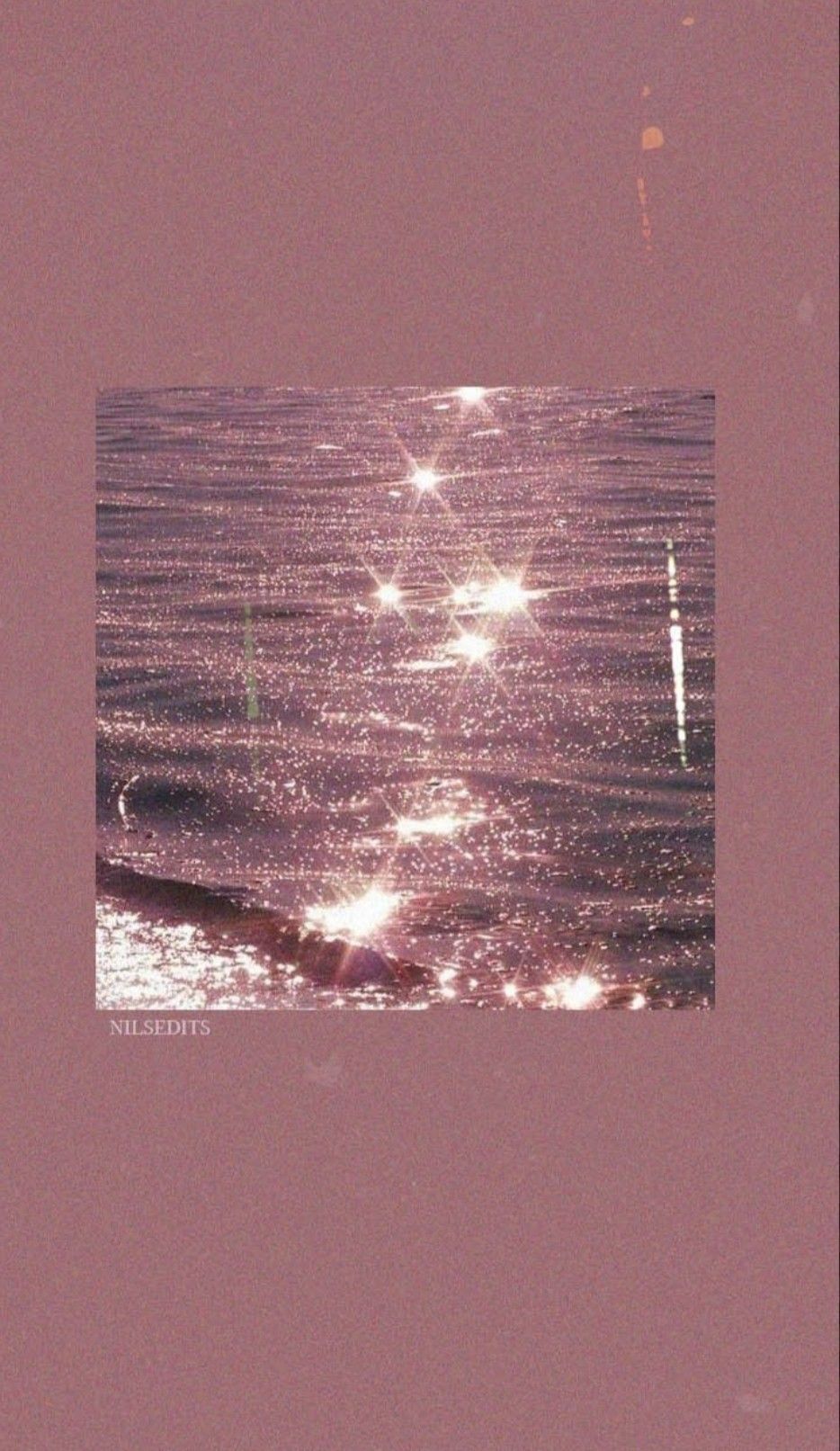 A pink cover with the sun reflecting on water - Bling