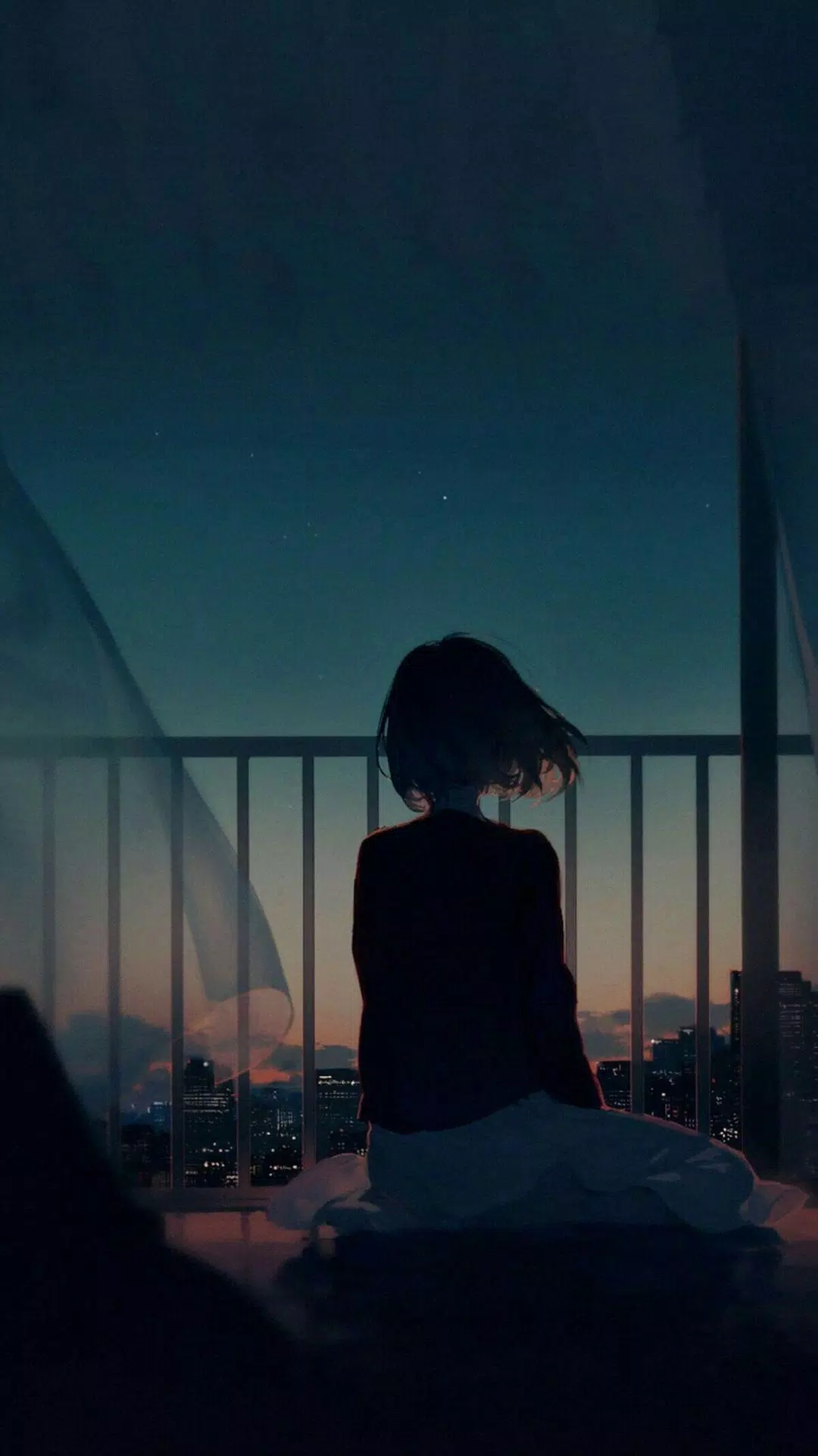 A woman sitting on a balcony at night looking at the stars - Depressing