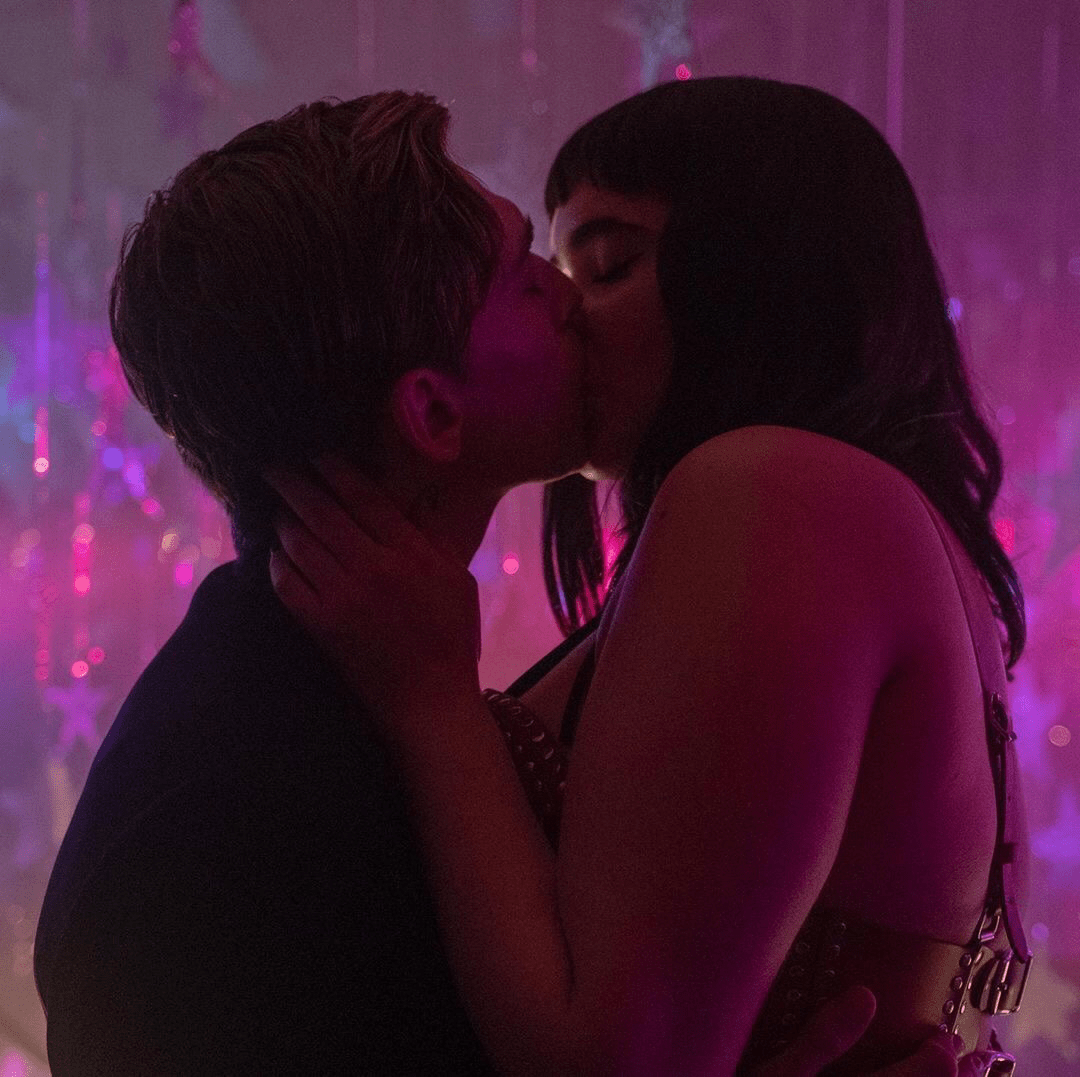 Chella and Raffi kiss in a pink lit room - Austin Abrams