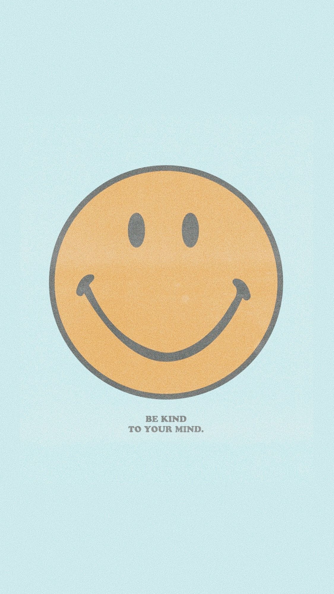 A phone wallpaper with a smiley face and the words 