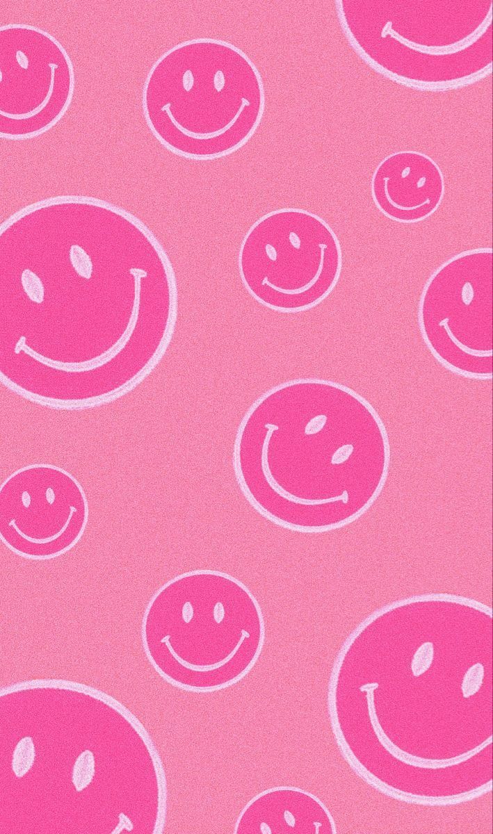 Aesthetic pink wallpaper with white smiley faces - Smiley