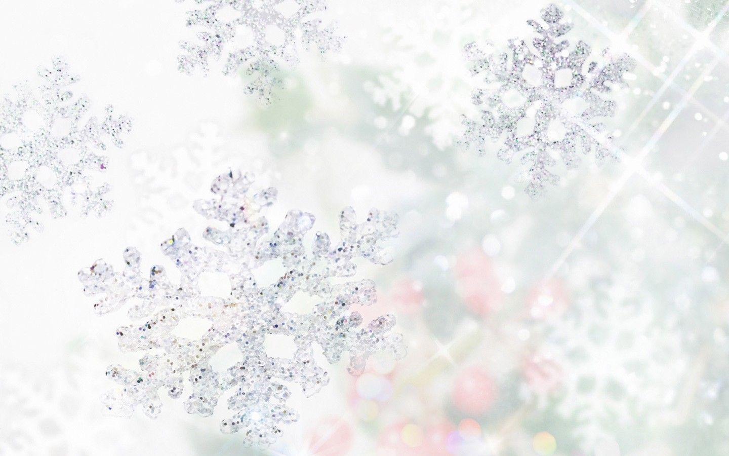A white and silver snowflake background - White Christmas