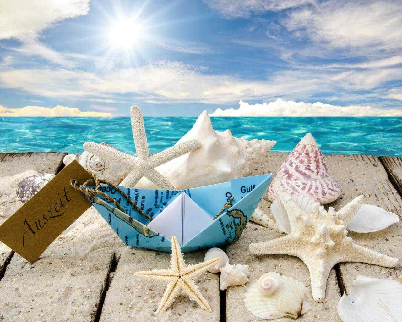 A paper boat with a ticket for a journey - Starfish