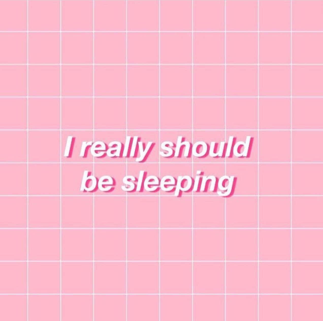 A pink grid background with the words 