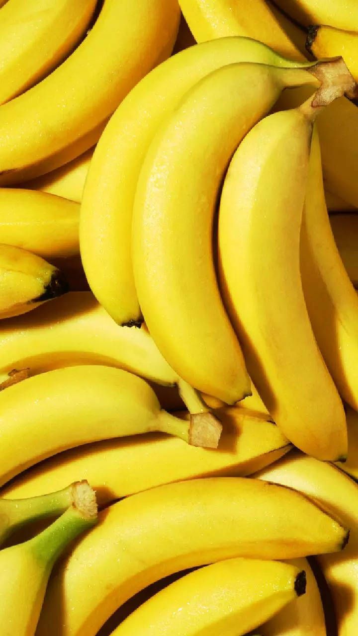 A pile of ripe yellow bananas. - Banana