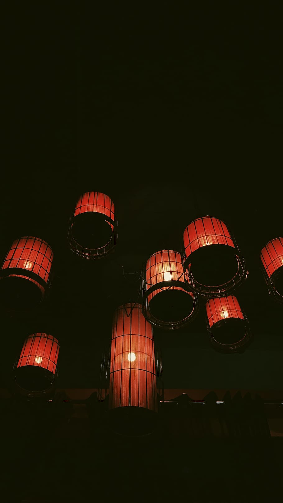 Red lanterns hanging from the ceiling - Dark orange