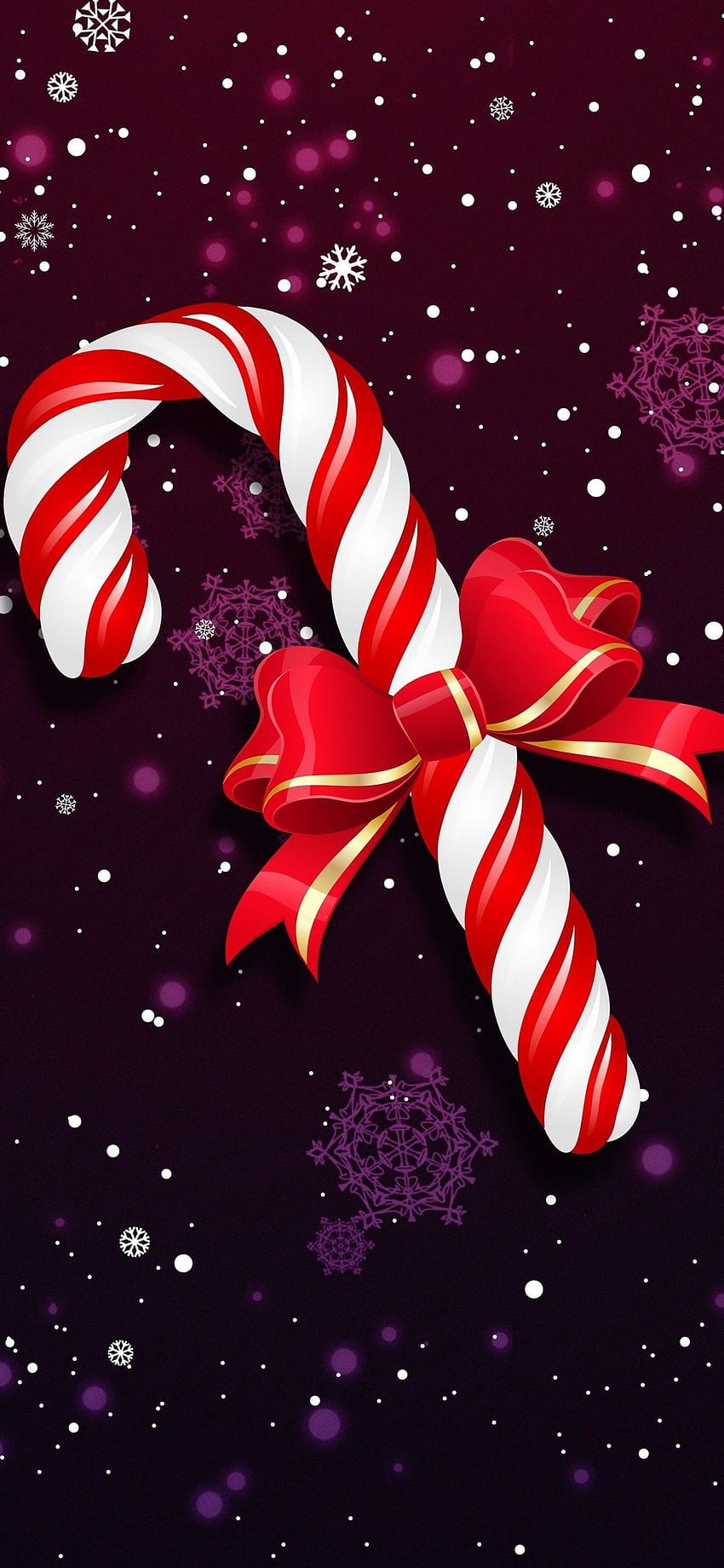 A candy cane with a red bow on a purple background with snowflakes. - Candy cane