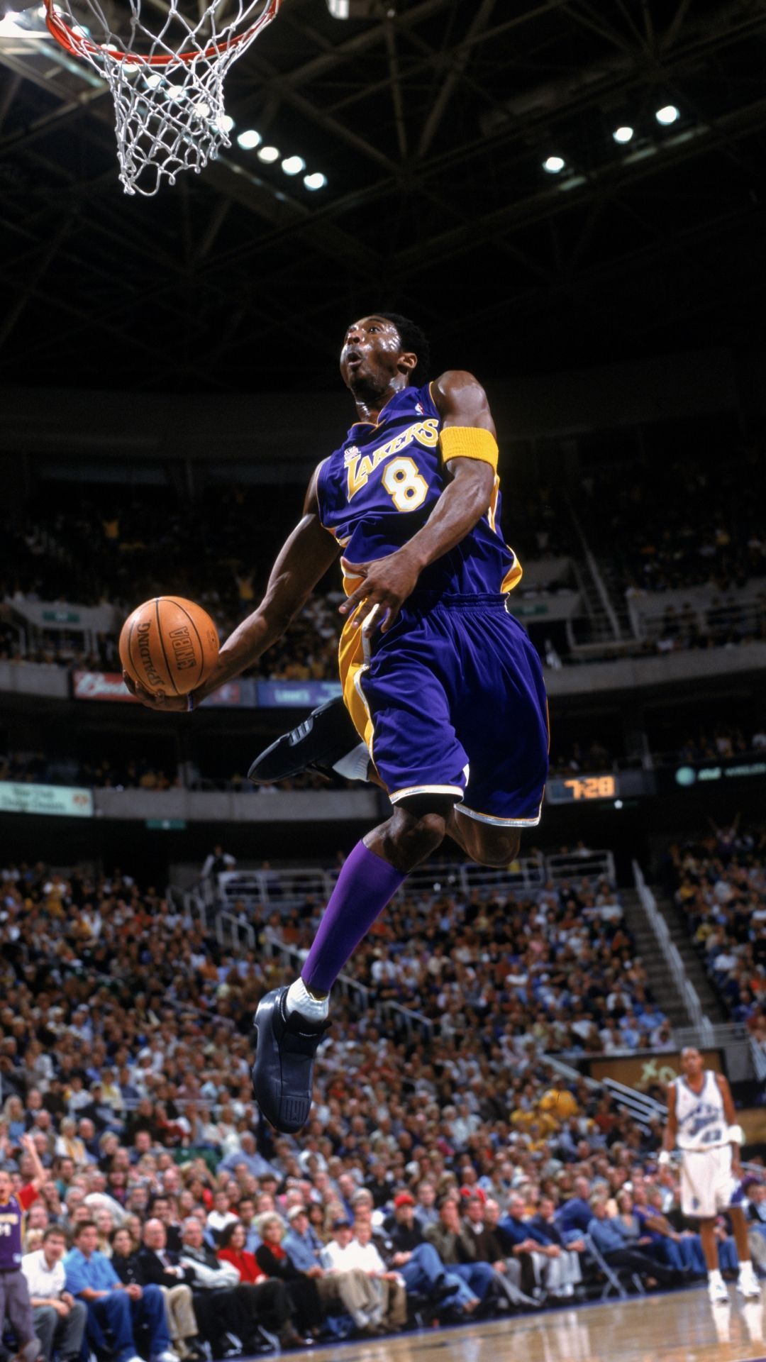 Kobe Bryant in the air with the ball in hand - Kobe Bryant
