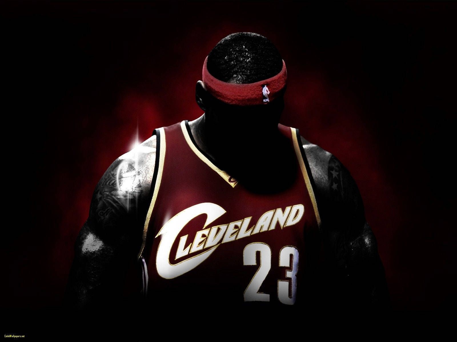 Download Lebron James rocking a red Cleveland Cavaliers jersey Wallpaper