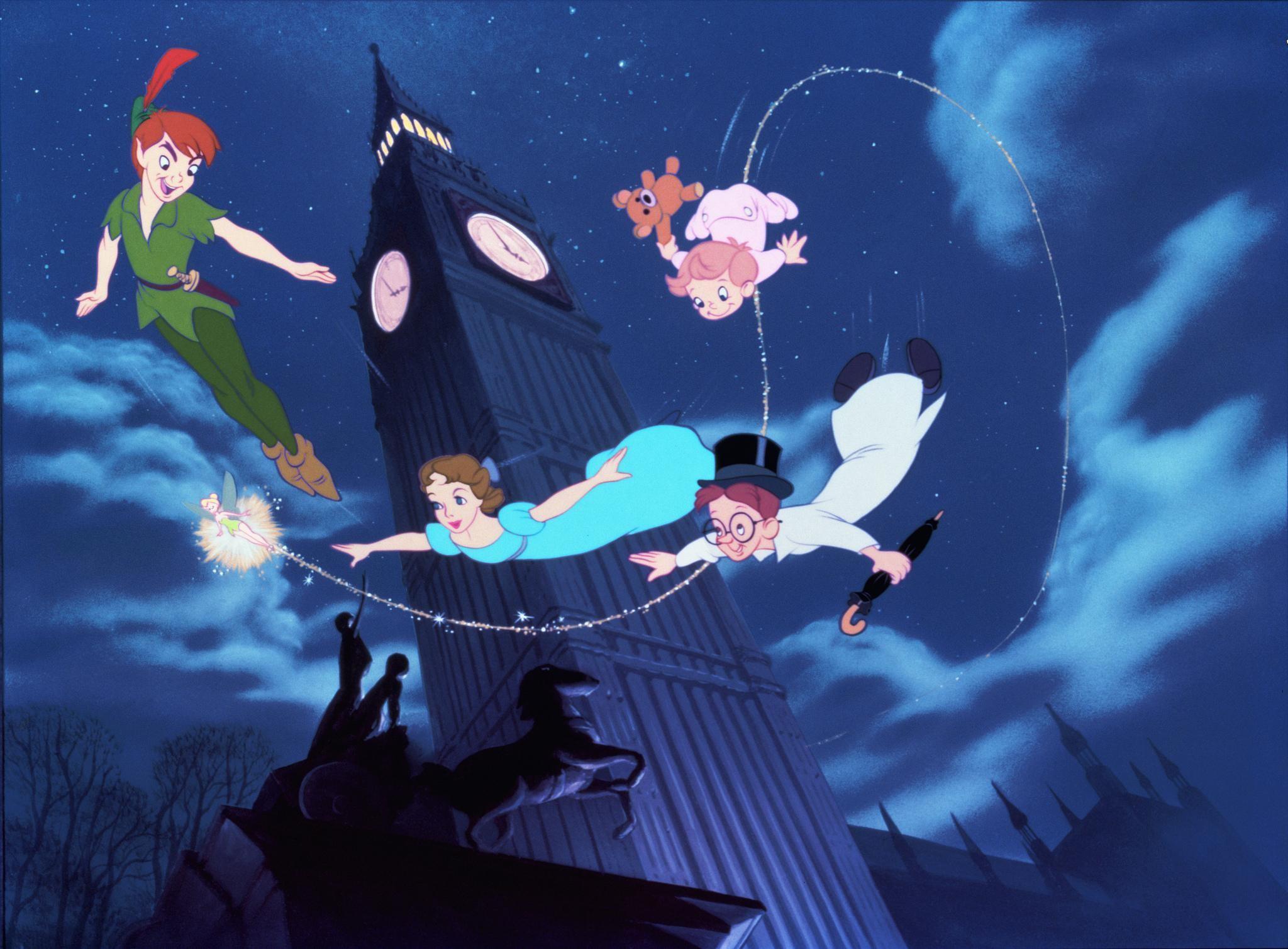 Peter Pan flying with Wendy, John, and Michael Darling above the London skyline - Peter Pan