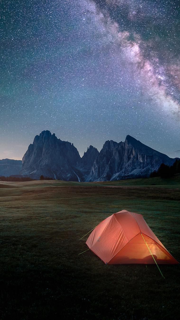 A tent under the stars in the Dolomites - Camping