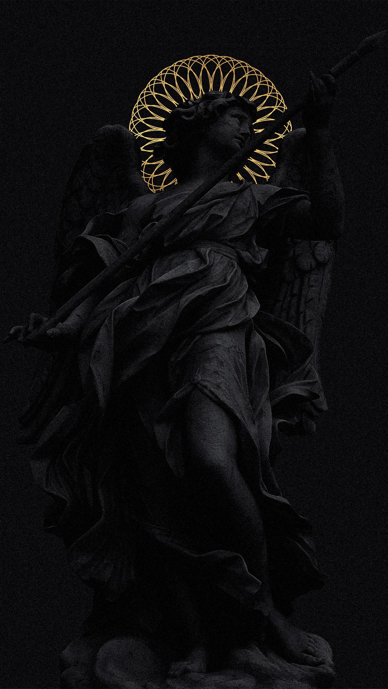 A black and gold angel statue - Statue