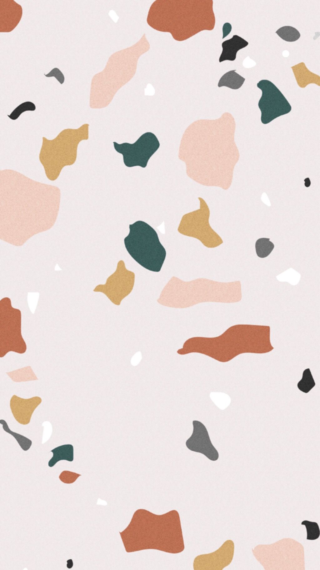 A graphic of a terrazzo pattern in pink, green, brown, black, and white. - Terrazzo