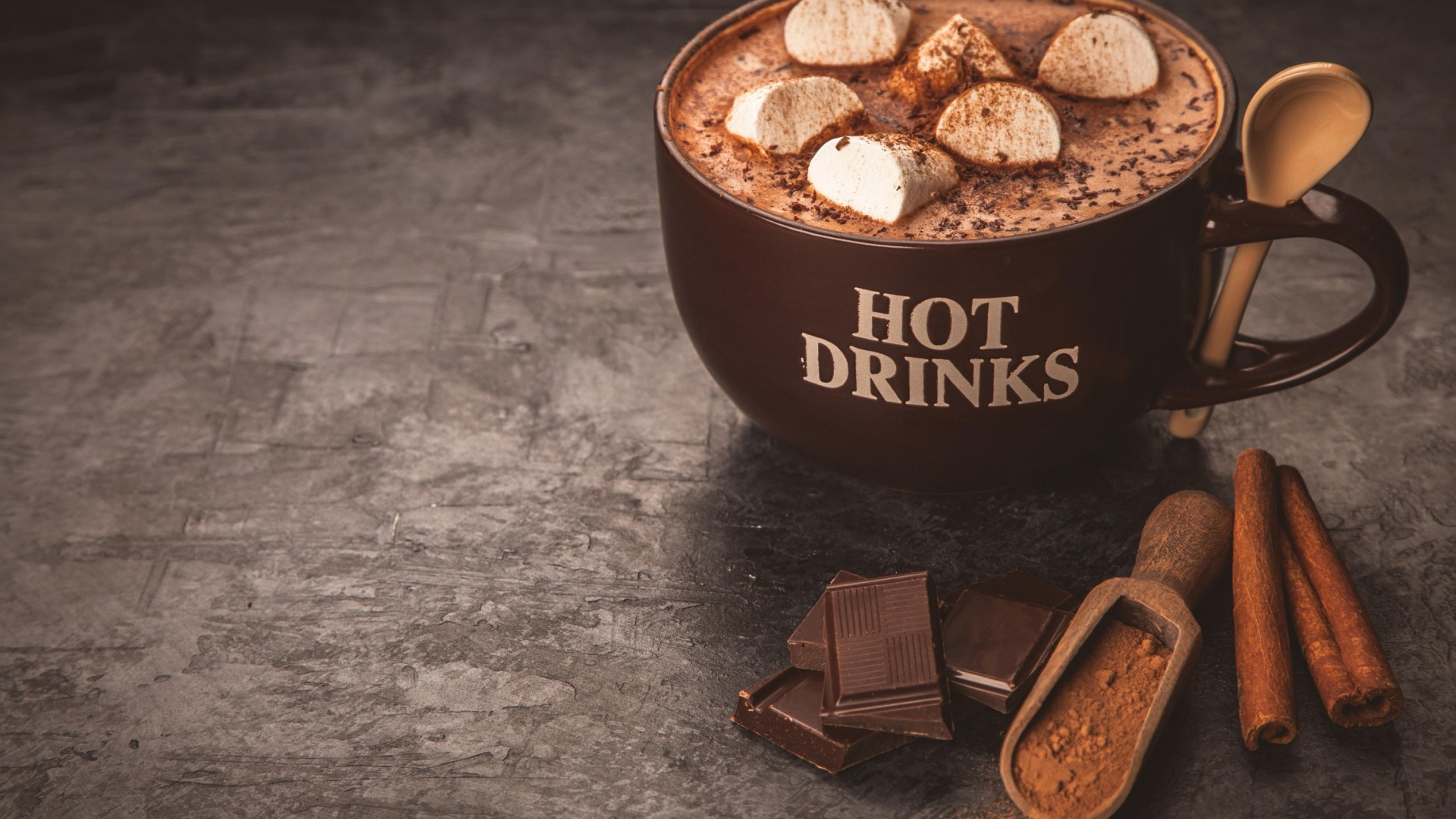 A cup of hot drinks with marshmallows and cinnamon - Chocolate, marshmallows