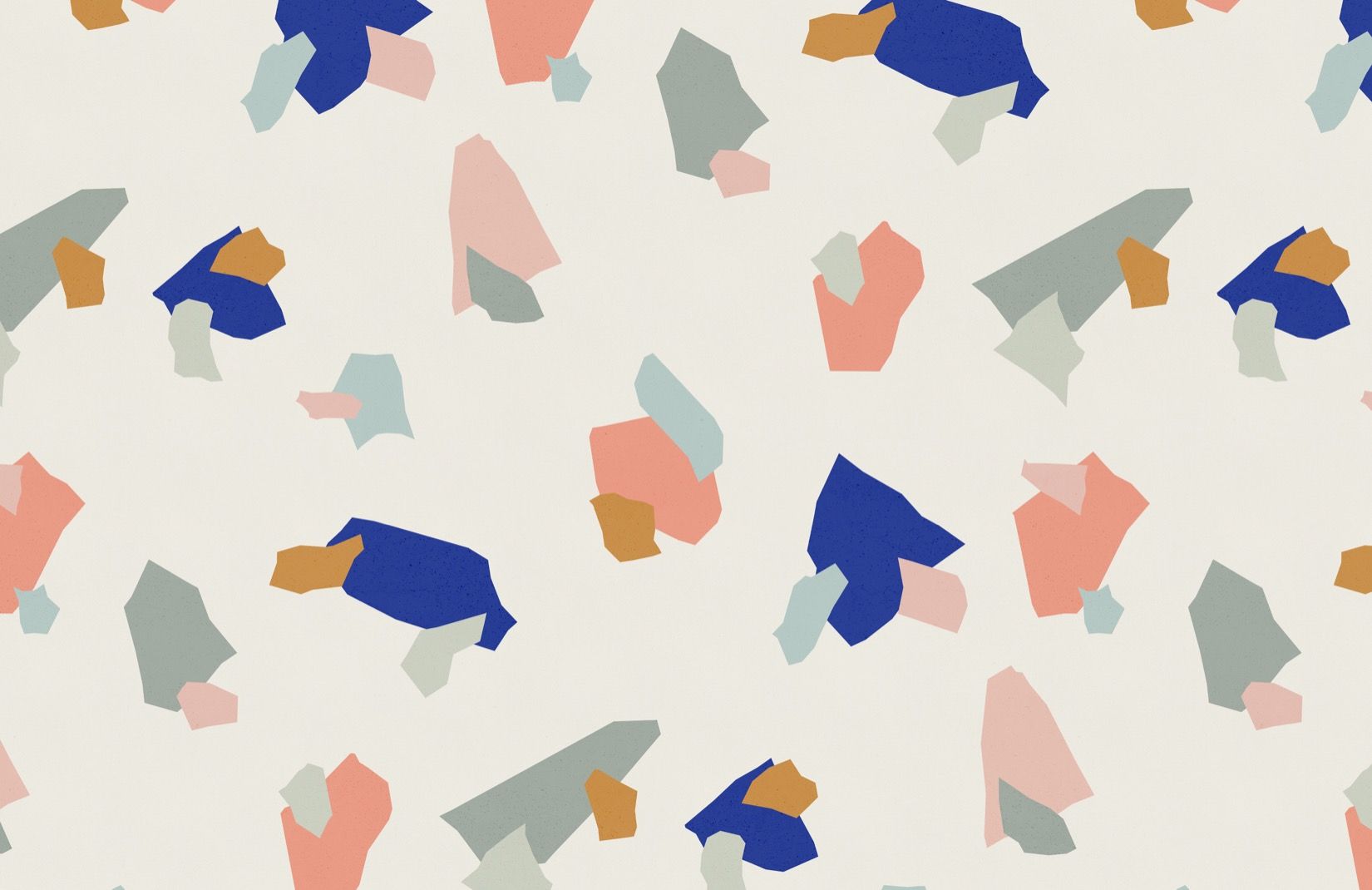 A pattern of abstract shapes in blue, pink, orange and grey on a cream background - Terrazzo