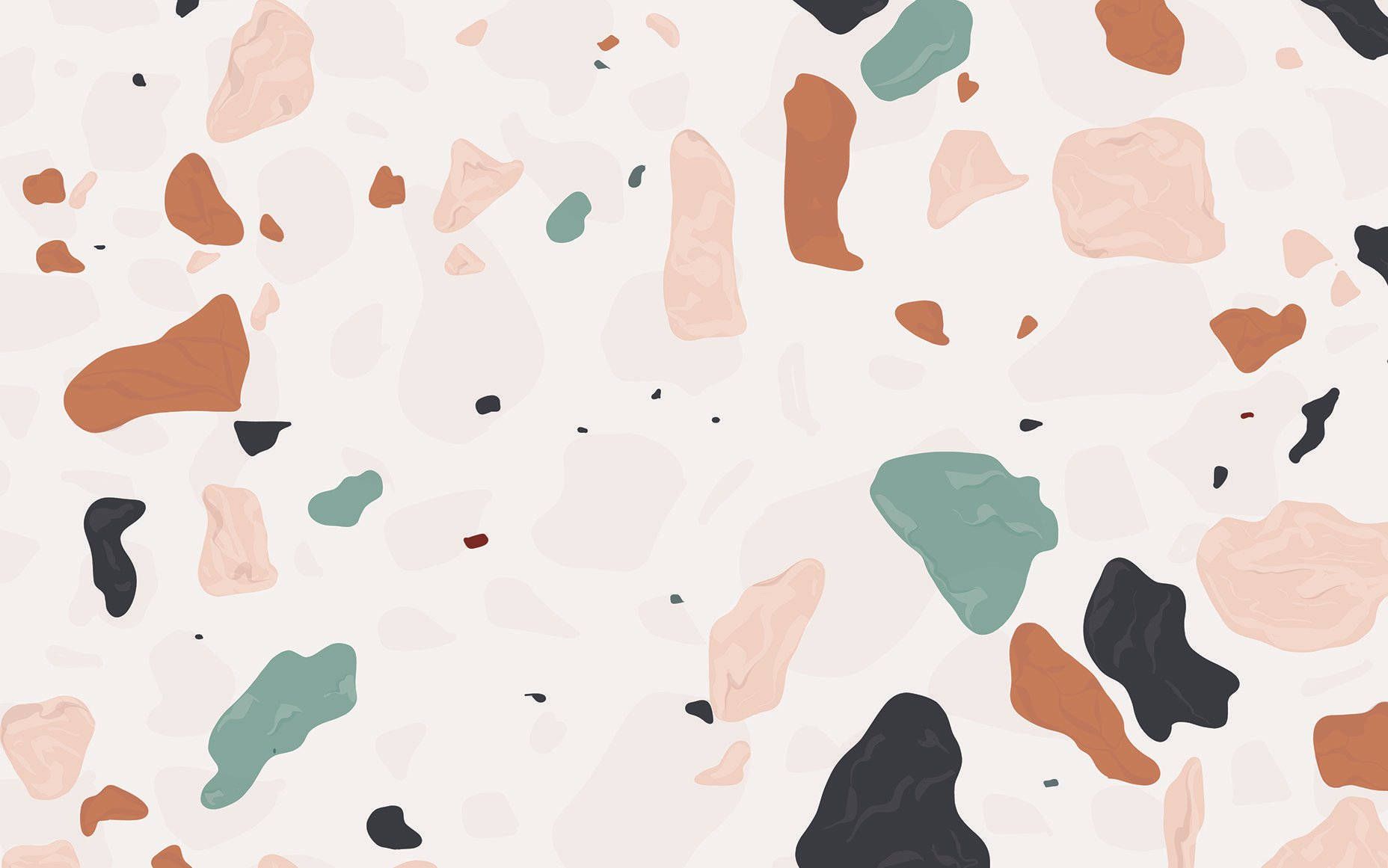 A pattern of different colored rocks on a white background - Terrazzo