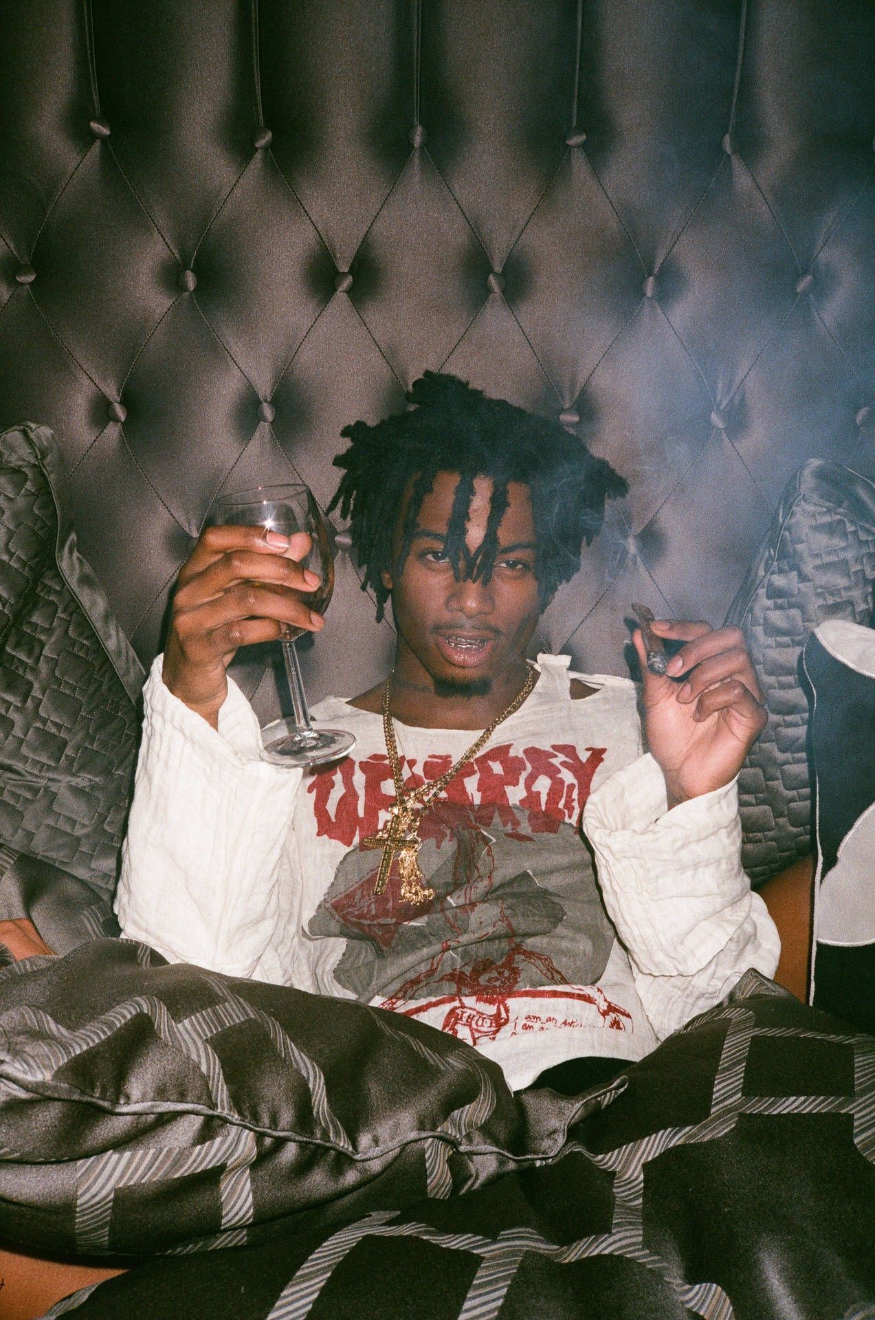 Download Playboi Carti getting some much needed rest Wallpaper