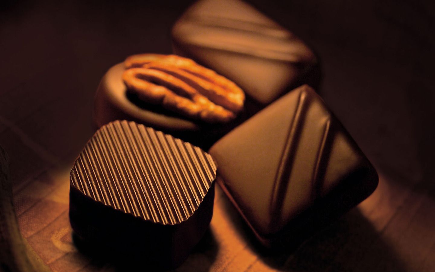 Chocolates on a wooden table - Chocolate