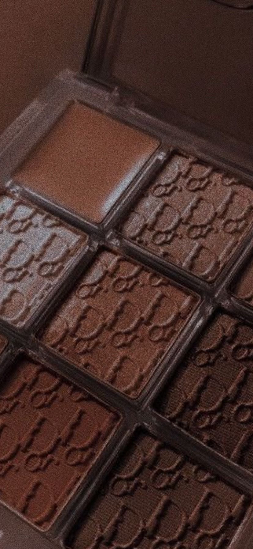 A close up of a palette of chocolate brown eyeshadow - Chocolate