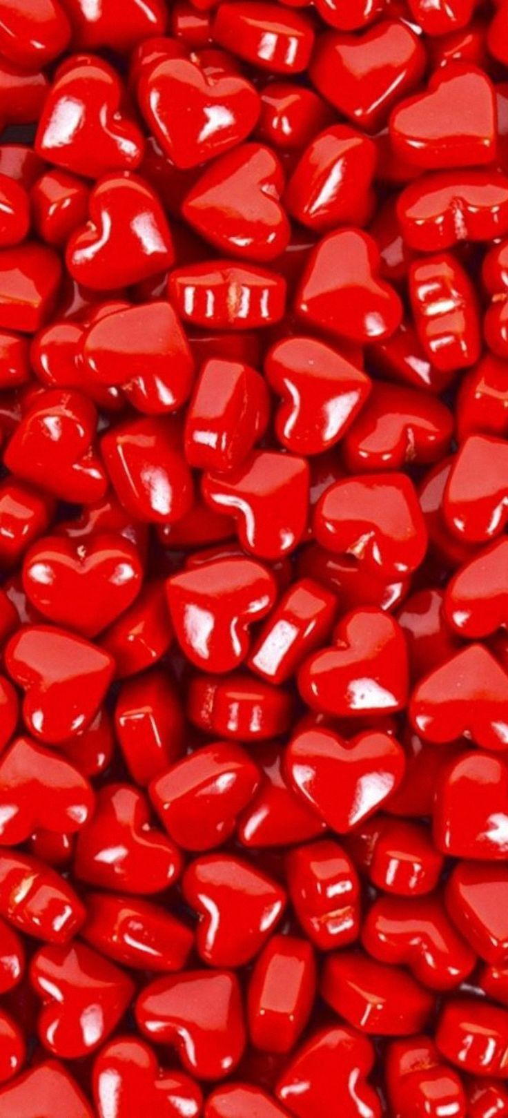 Red hearts wallpaper for iPhone and Android - Candy