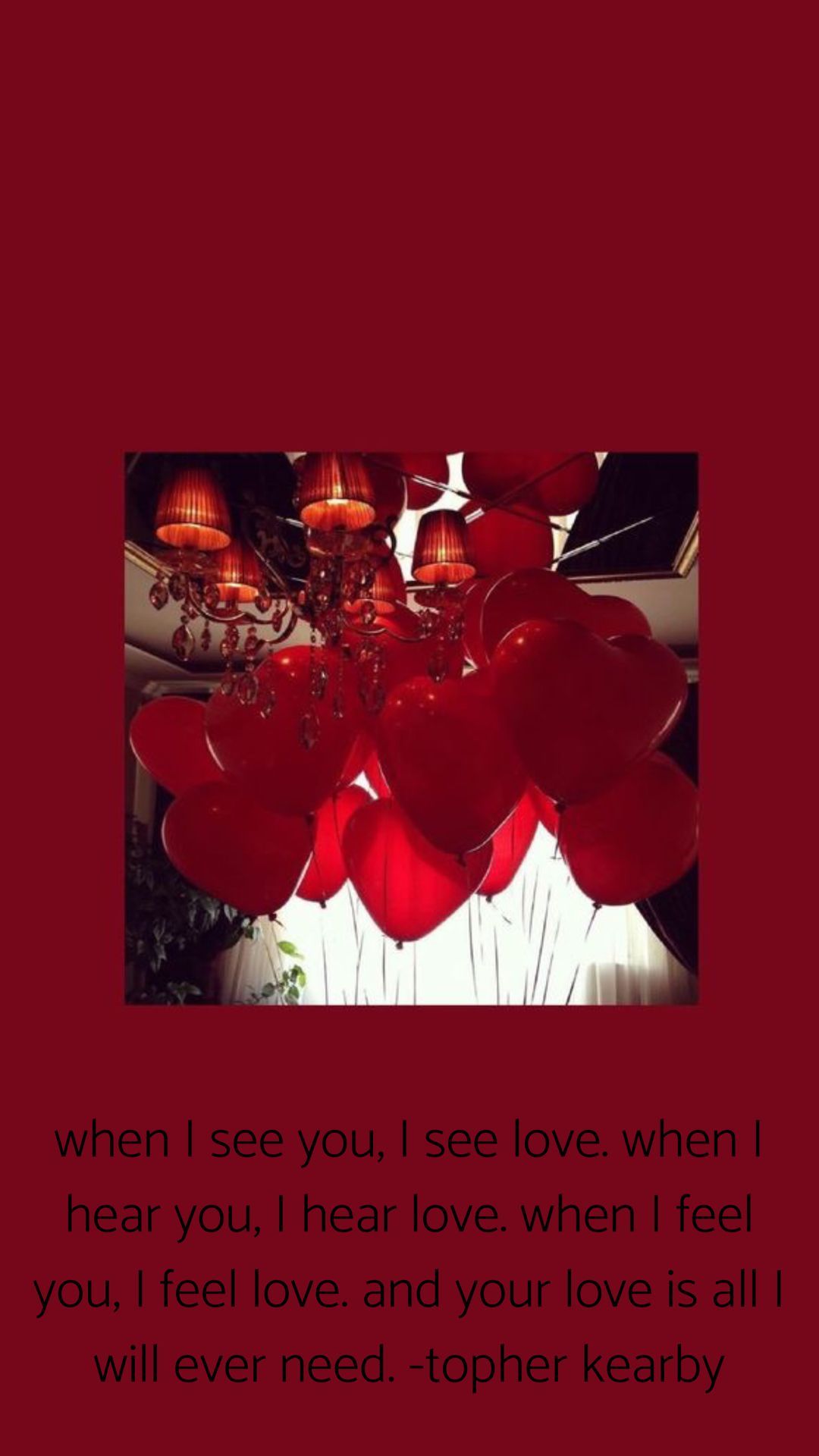 A bunch of red balloons in the shape of hearts. - Crimson