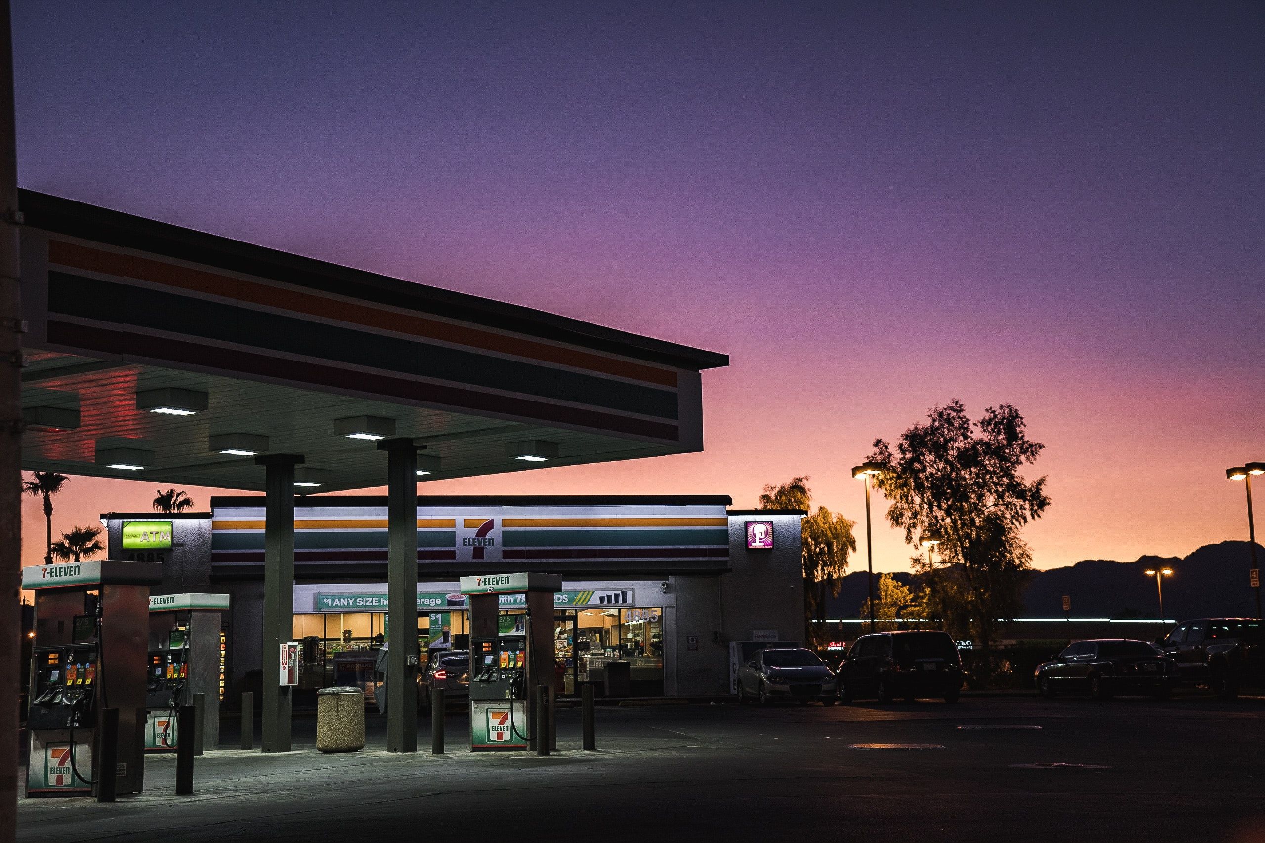 A gas station at night with a purple sky - Las Vegas