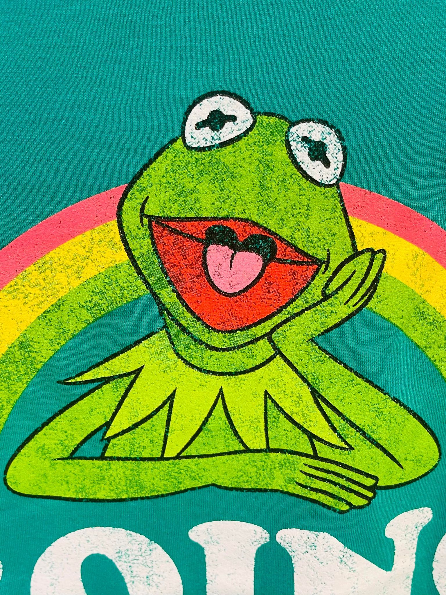 Kermit the Frog graphic on a blue shirt - Kermit the Frog