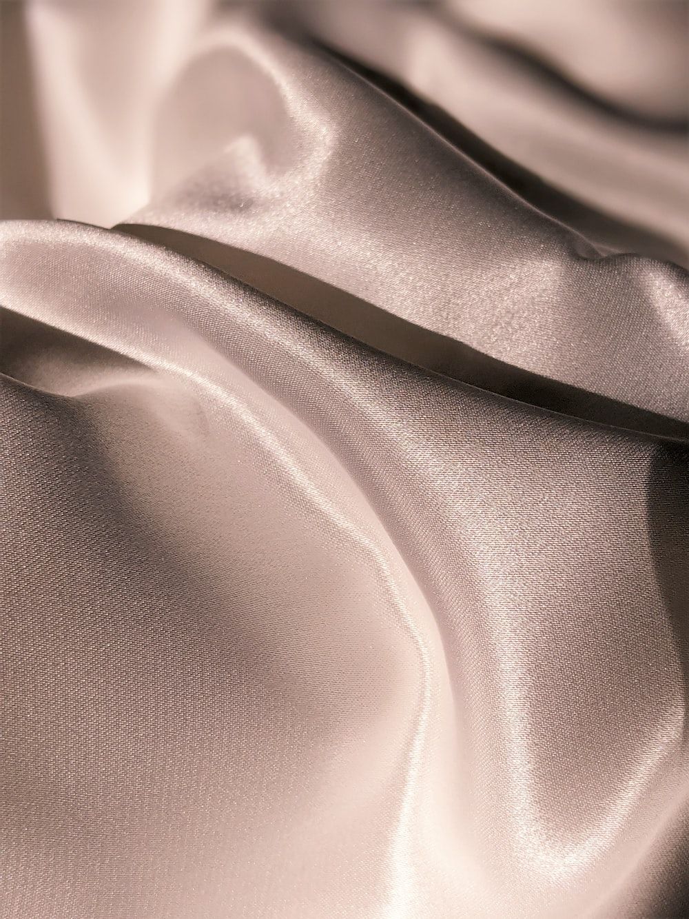 A close up of a pink silk fabric - Silk