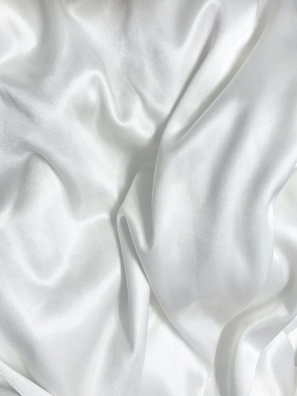 A white silk fabric with a wrinkled texture - Silk