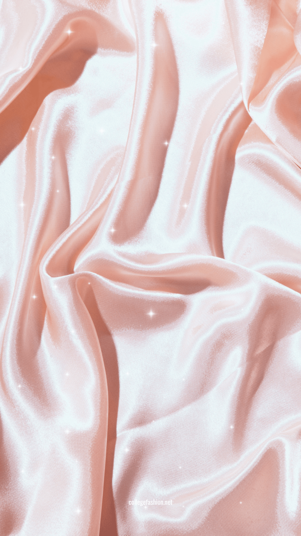 A close up of a pink silk fabric with a subtle sparkle - Silk